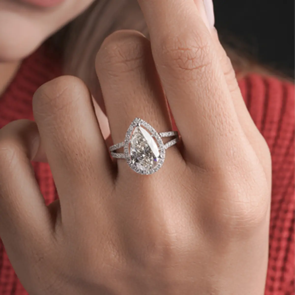 3 Carat pear diamond halo engagement ring with accent