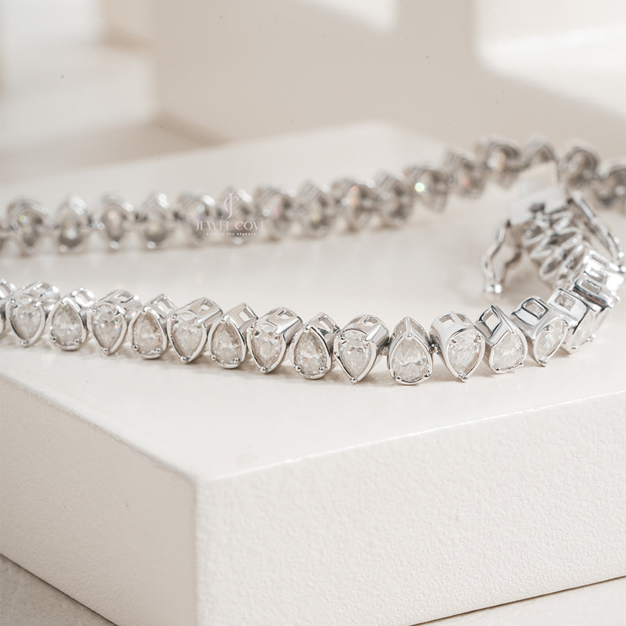 White Gold Moissanite Pear-Shaped Diamond Tennis Bracelet with Elegant Bezel Setting