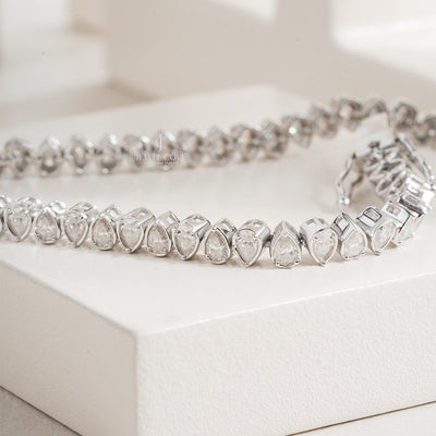 White Gold Moissanite Pear-Shaped Diamond Tennis Bracelet with Elegant Bezel Setting