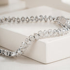White Gold Moissanite Pear-Shaped Diamond Tennis Bracelet with Elegant Bezel Setting