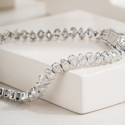 White Gold Moissanite Pear-Shaped Diamond Tennis Bracelet with Elegant Bezel Setting