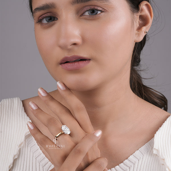 Oval Cut Moissanite Diamond Engagement Ring with Classic Four-Prong Setting and Gold Band