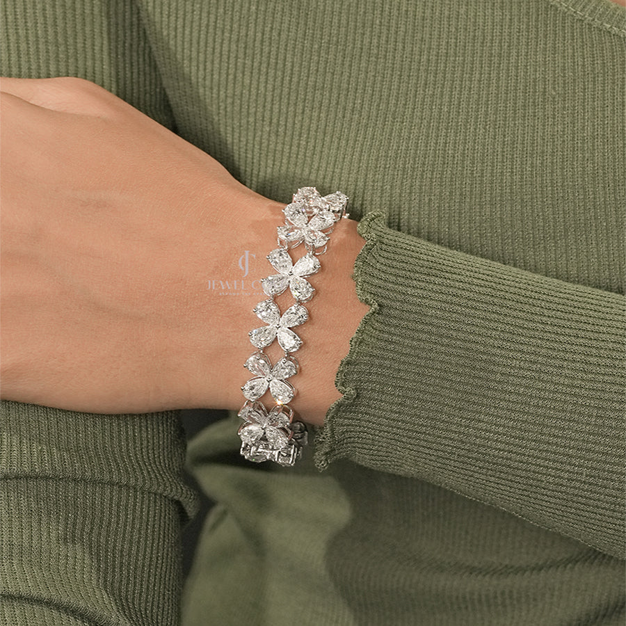 Delicate Pear Moissanite Diamond Bracelet Woman’s Wrist – Minimalist Jewelry Style