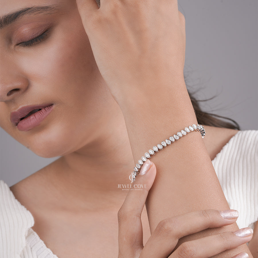 White Gold Lab Grown Pear-Shaped Diamond Tennis Bracelet with Elegant Bezel Setting