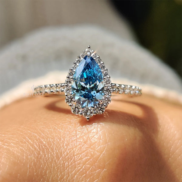 Cyan Blue Pear Diamond Ring In cathedral setting | Lab Grown Diamonds | IGI Certified - hover