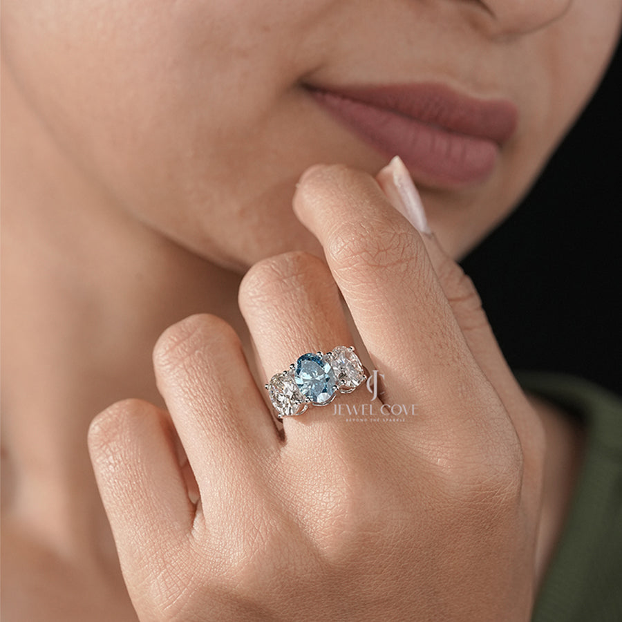 Three Stone Oval Ring with Blue Diamond and White Side Diamond