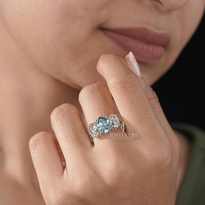 Three Stone Oval Ring with Blue Diamond and White Side Diamond