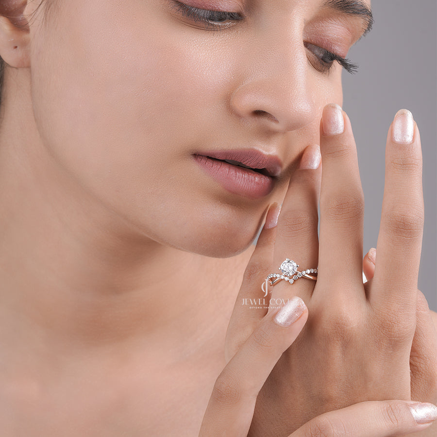 Round Cut Moissanite Diamond Engagement Ring with Twisted Pave Band and Four-Prong Setting