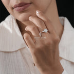 Exquisite Oval Diamond Ring with Tapered Round Side Stones