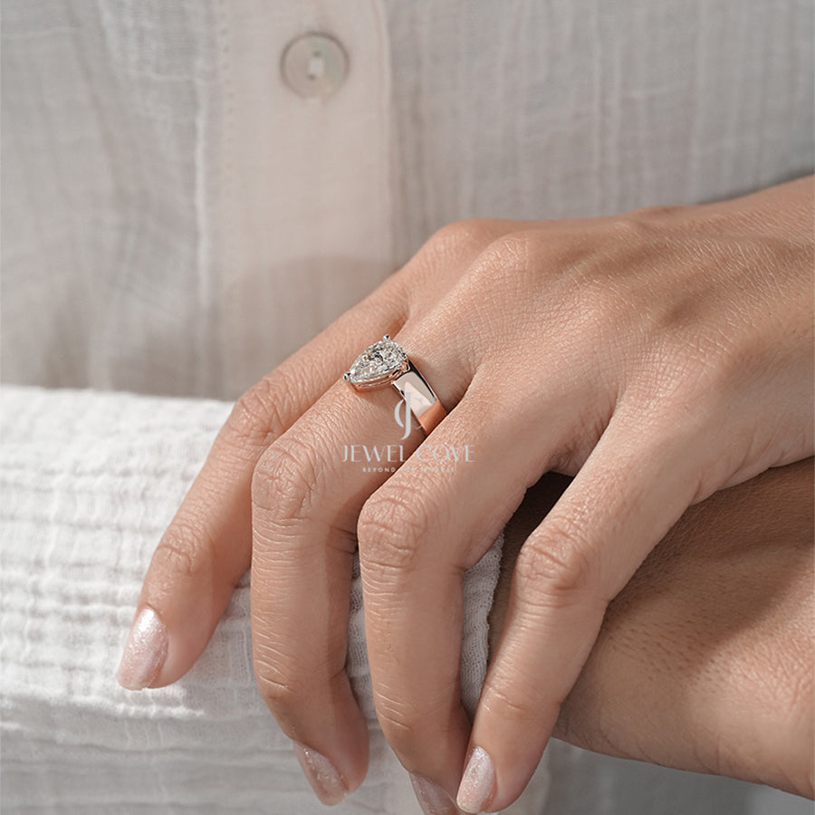 Timeless Solitaire with Pear Modern Classic Diamond Ring