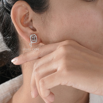 Brilliant Halo Emerald Diamond Stud Earrings with side round diamond