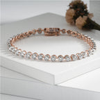 Classic White Gold Tennis Bracelet on Woman’s Wrist – Luxury Jewelry Style