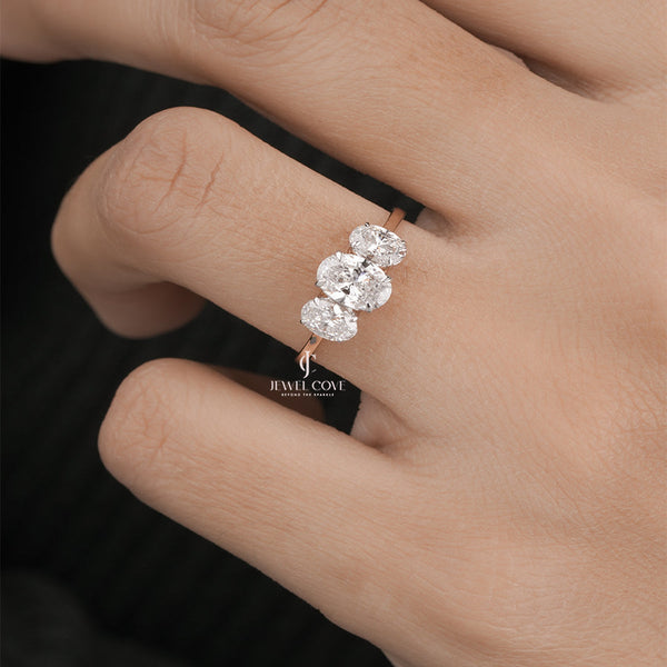 Three Stone Oval Moissanite Diamond Ring for Women in Rose Gold | IGI Certified | E-F Color | VVS- VS Clarity - hover