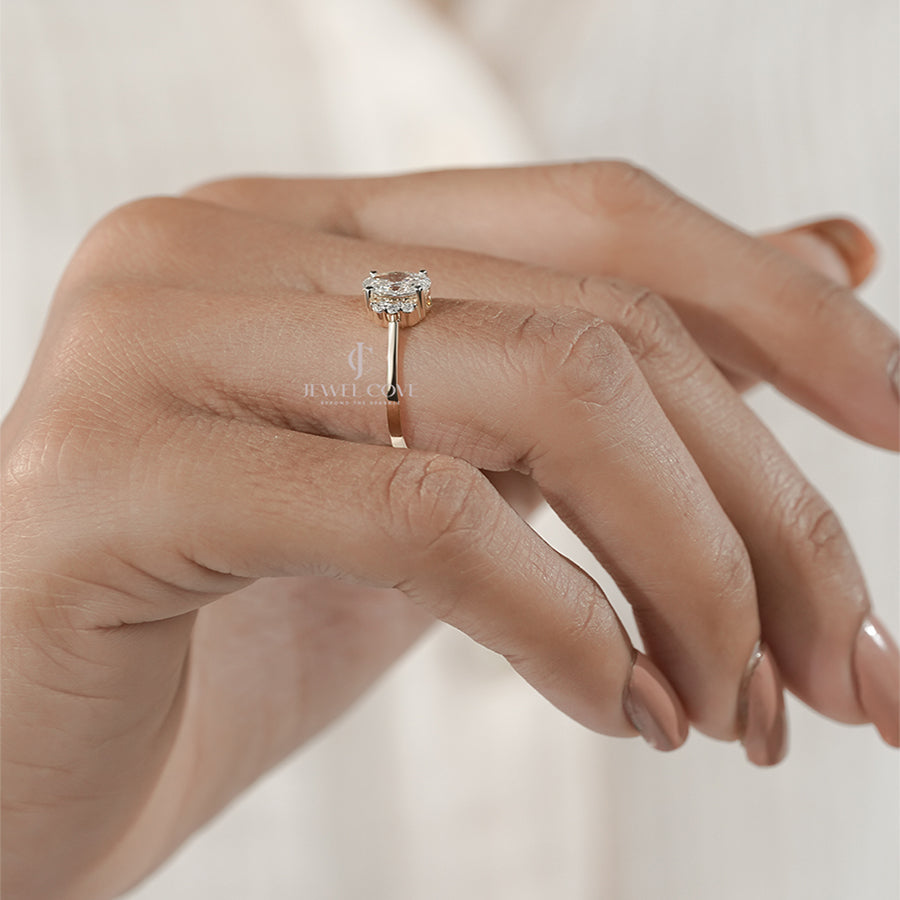 Oval Cut Diamond Engagement Ring with Side Halo on Gold Band