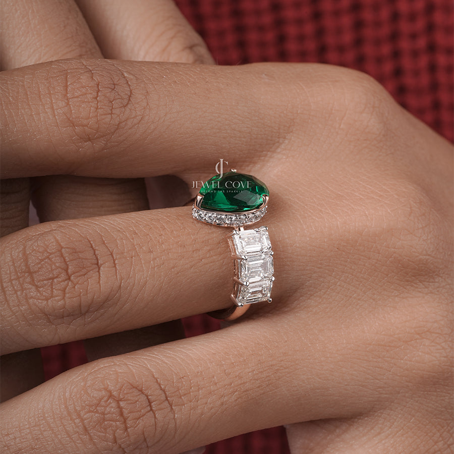 Maurya Pear Emerald Open Living Leaf Side Emerald Wedding Ring