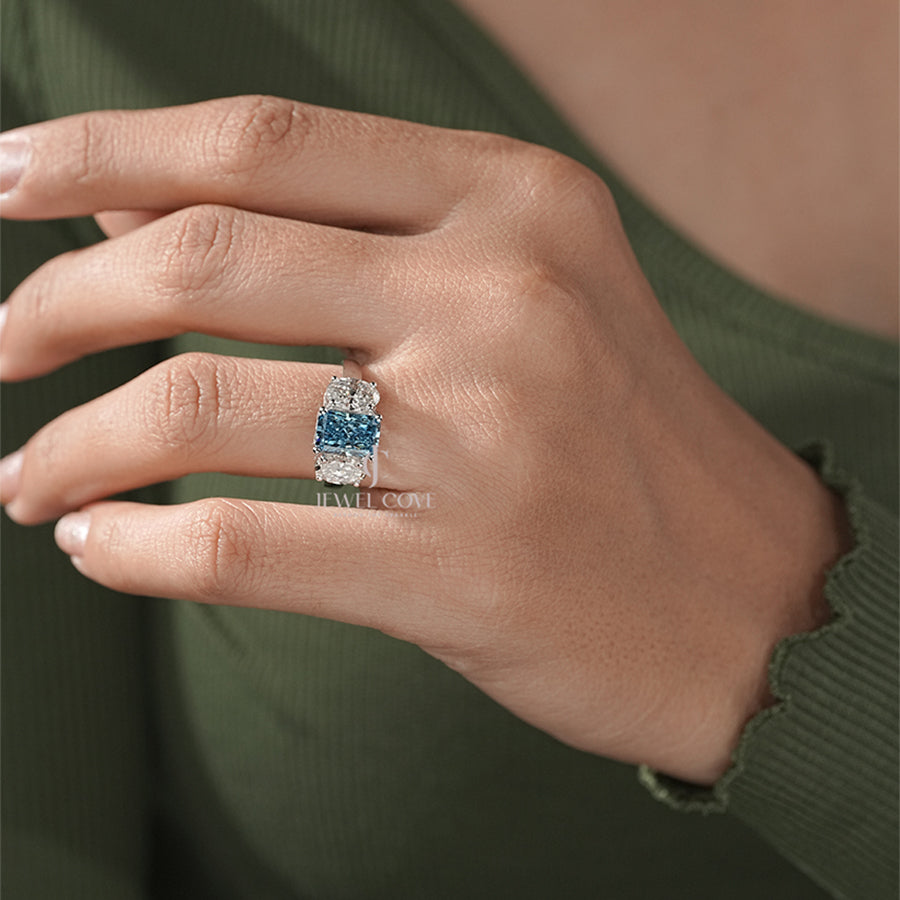Three Stone Ring with Emerald Cut Blue Diamond and Oval Ring