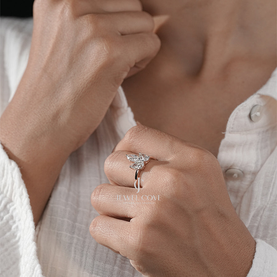 Elegant Marquise Triple Diamond Ring with Pear Side Diamond