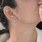 Brilliant Halo Emerald Diamond Stud Earrings with side round diamond