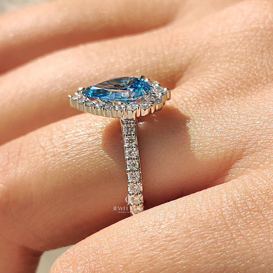 Cyan Blue Pear Diamond Ring In cathedral setting | Lab Grown Diamonds | IGI Certified