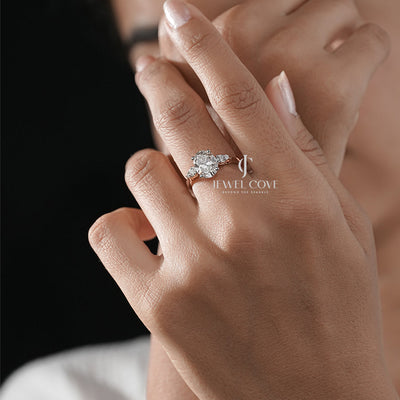 Exquisite Oval Diamond Ring with Tapered Round Side Stones