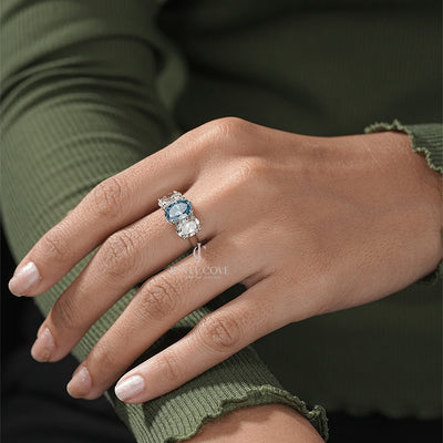 Three Stone Oval Ring with Blue Diamond and White Side Diamond