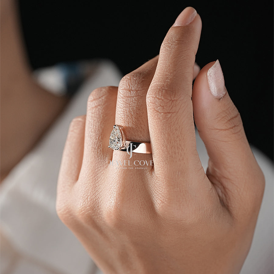 Timeless Solitaire with Pear Modern Classic Diamond Ring