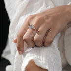 Exquisite Oval Diamond Ring with Tapered Round Side Stones