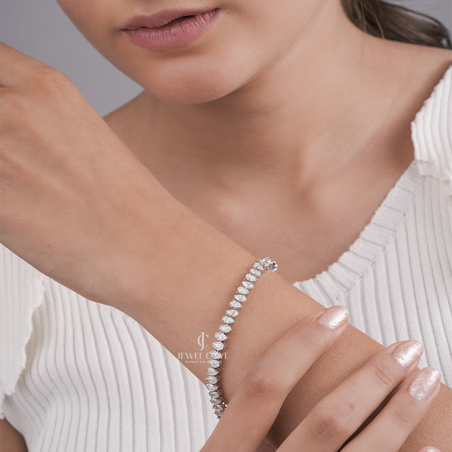 White Gold Moissanite Pear-Shaped Diamond Tennis Bracelet with Elegant Bezel Setting
