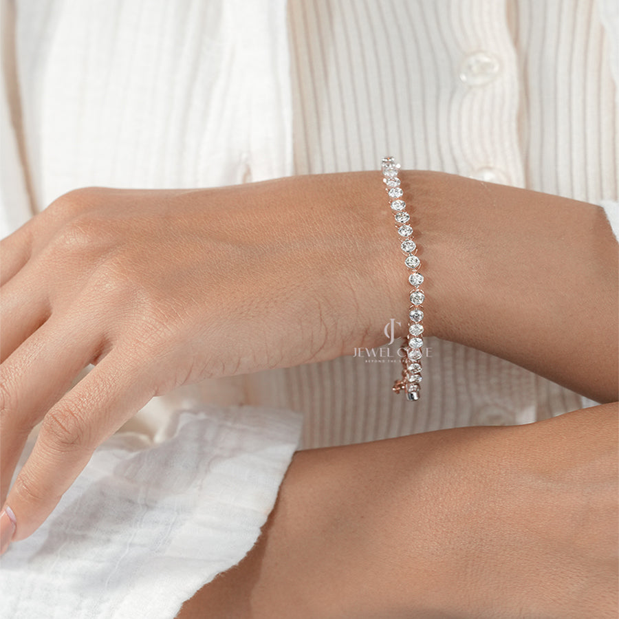 Classic White Gold Tennis Bracelet on Woman’s Wrist – Luxury Jewelry Style