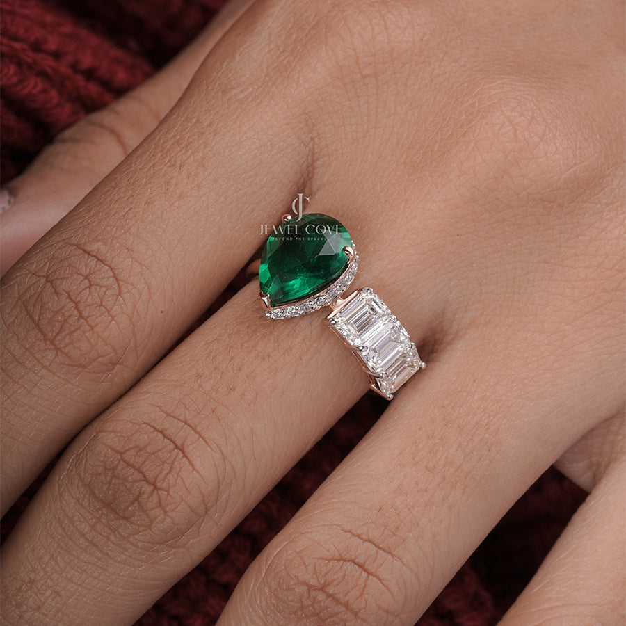 Maurya Pear Moissanite Emerald Open Living Leaf Side Emerald Wedding Ring