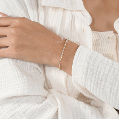 Elegant Diamond Tennis Bracelet on Woman’s Wrist – Minimalist Jewelry Style