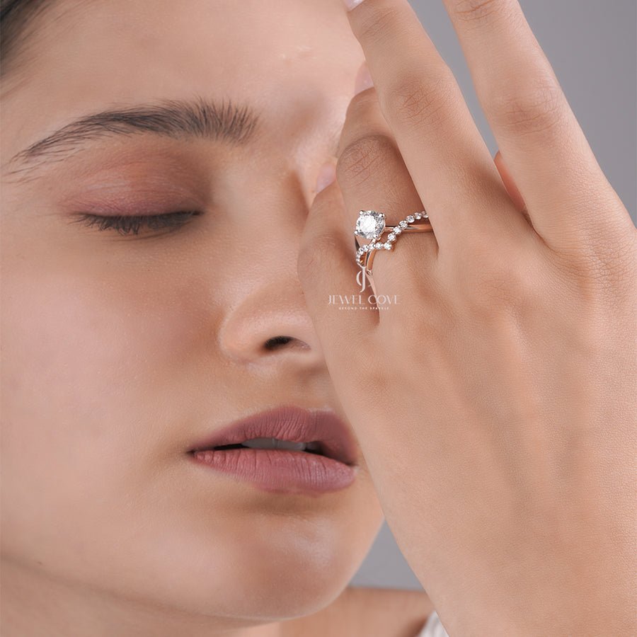 Round Cut Moissanite Diamond Engagement Ring with Twisted Pave Band and Four-Prong Setting