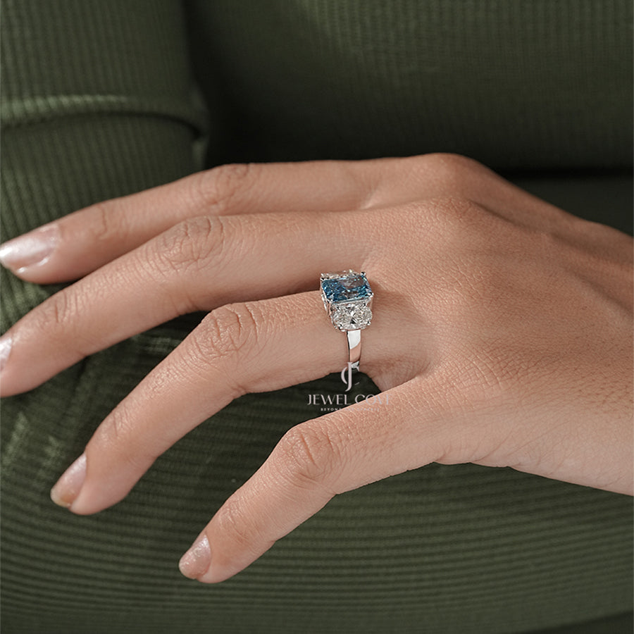 Three Stone Ring with Emerald Cut Blue Diamond and Oval Ring