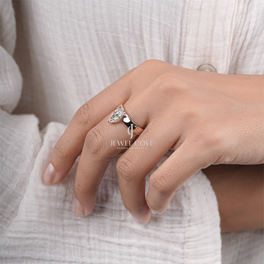 Timeless Solitaire with Pear Modern Classic Diamond Ring