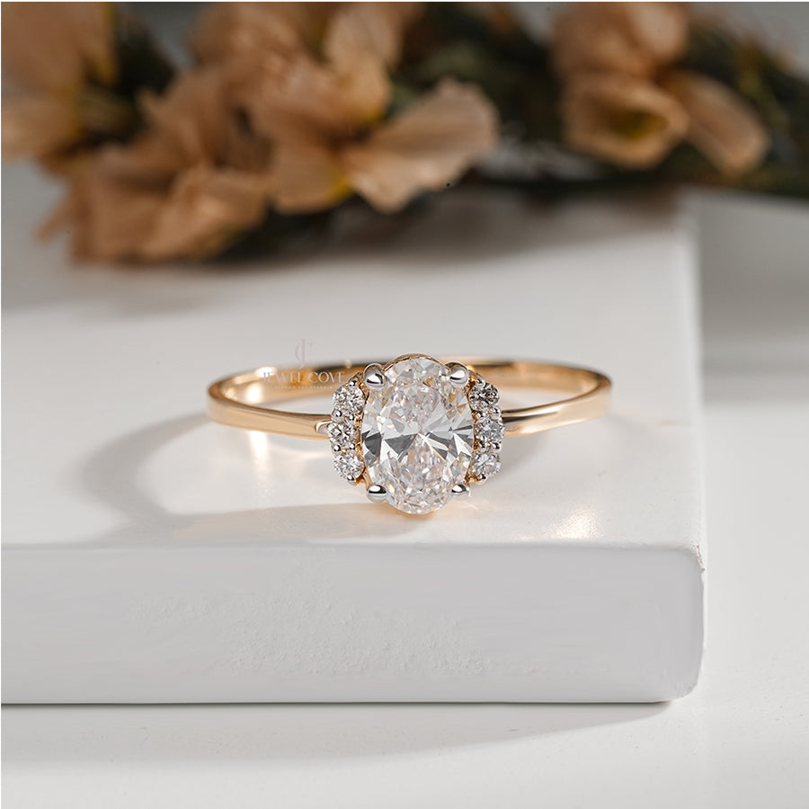 Oval Cut Diamond Engagement Ring with Side Halo on Gold Band