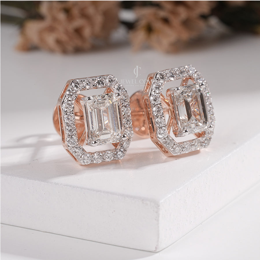 Brilliant Halo Emerald Diamond Stud Earrings with side round diamond