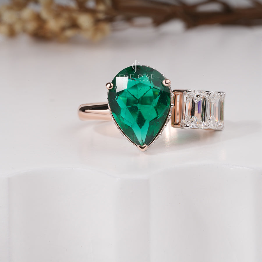 Maurya Pear Moissanite Emerald Open Living Leaf Side Emerald Wedding Ring