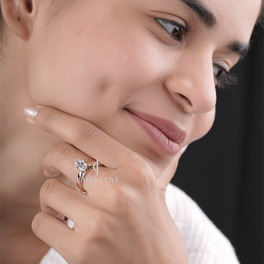 Timeless Solitaire with Pear Modern Classic Diamond Ring
