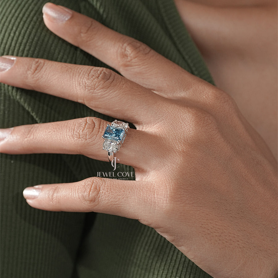 Three Stone Ring with Emerald Cut Blue Diamond and Oval Ring