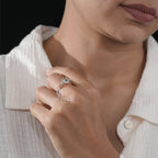 Exquisite Oval Diamond Ring with Tapered Round Side Stones