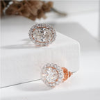 Oval Halo Diamond Stud Earrings in White Gold