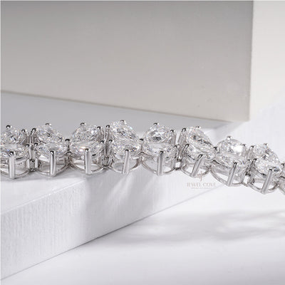 Delicate Pear Moissanite Diamond Bracelet Woman’s Wrist – Minimalist Jewelry Style