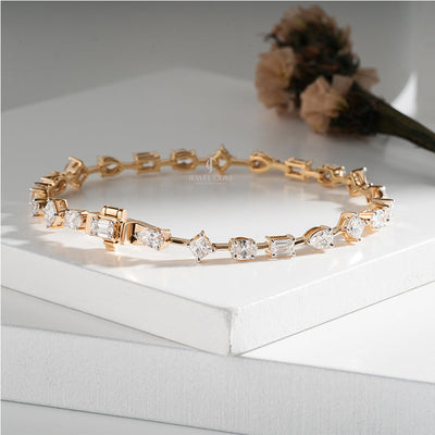 Delicate Gold Bracelet with Round and Princess Cut Diamonds