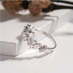 Elegant White Gold Diamond Ring with Baguette and Round Cuts