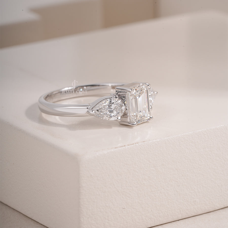 Emerald Cut Lab Grown Diamond Engagement Ring, Three Stone Setting with Pear Shape Side Diamonds