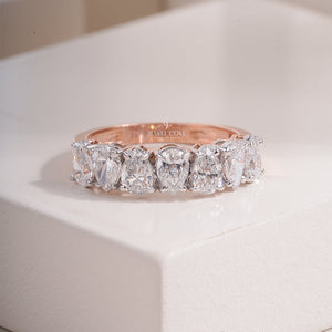 Pear Moissanite Seven-Stone Shared-Prong Ring | IGI Certified | E-F Color