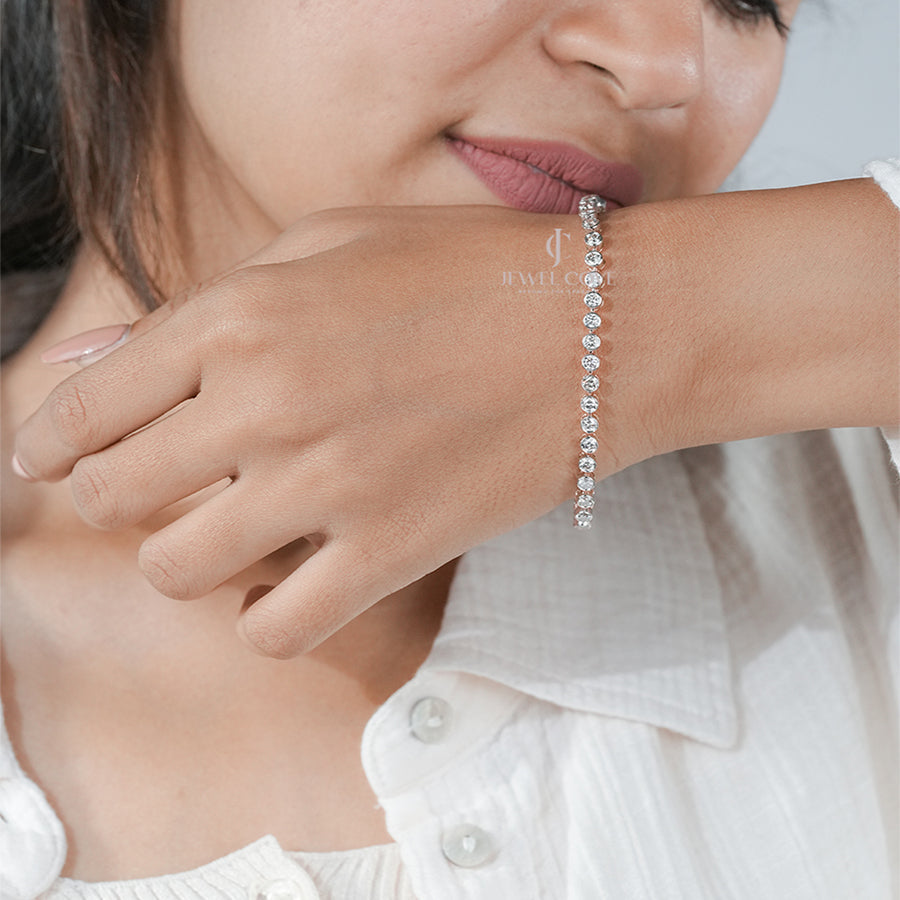 Classic White Gold Tennis Bracelet on Woman’s Wrist – Luxury Jewelry Style