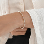 Elegant Diamond Tennis Bracelet on Woman’s Wrist – Minimalist Jewelry Style