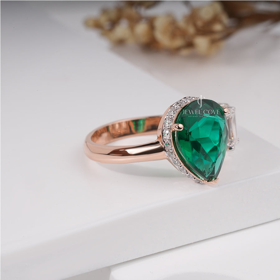 Maurya Pear Moissanite Emerald Open Living Leaf Side Emerald Wedding Ring