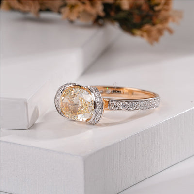 Bold 5.20 Carat Yellow Diamond Ring in 18K Gold with Pave Setting